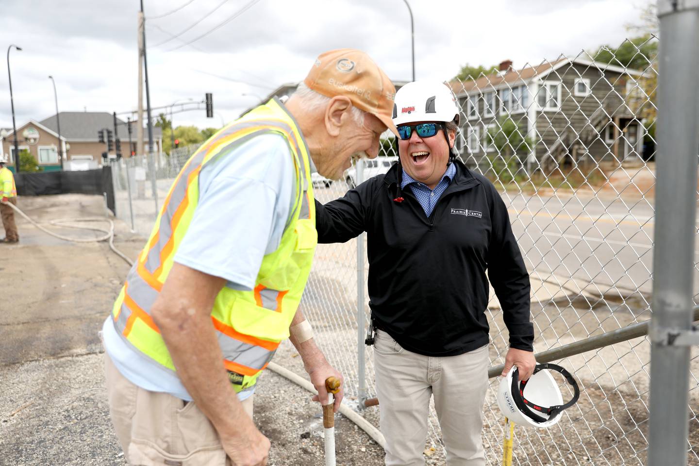 Elis Giannini (left) shares a laugh with Dave Patzelt, president of Shodeen Group, as demolition begins on Monday, Sept. 23, 2024 at Geneva Cycle Shop, located at 4 East State Street in Geneva. Giannini began his shop there in 1976 and sold to Wessel Court East LLC in April.