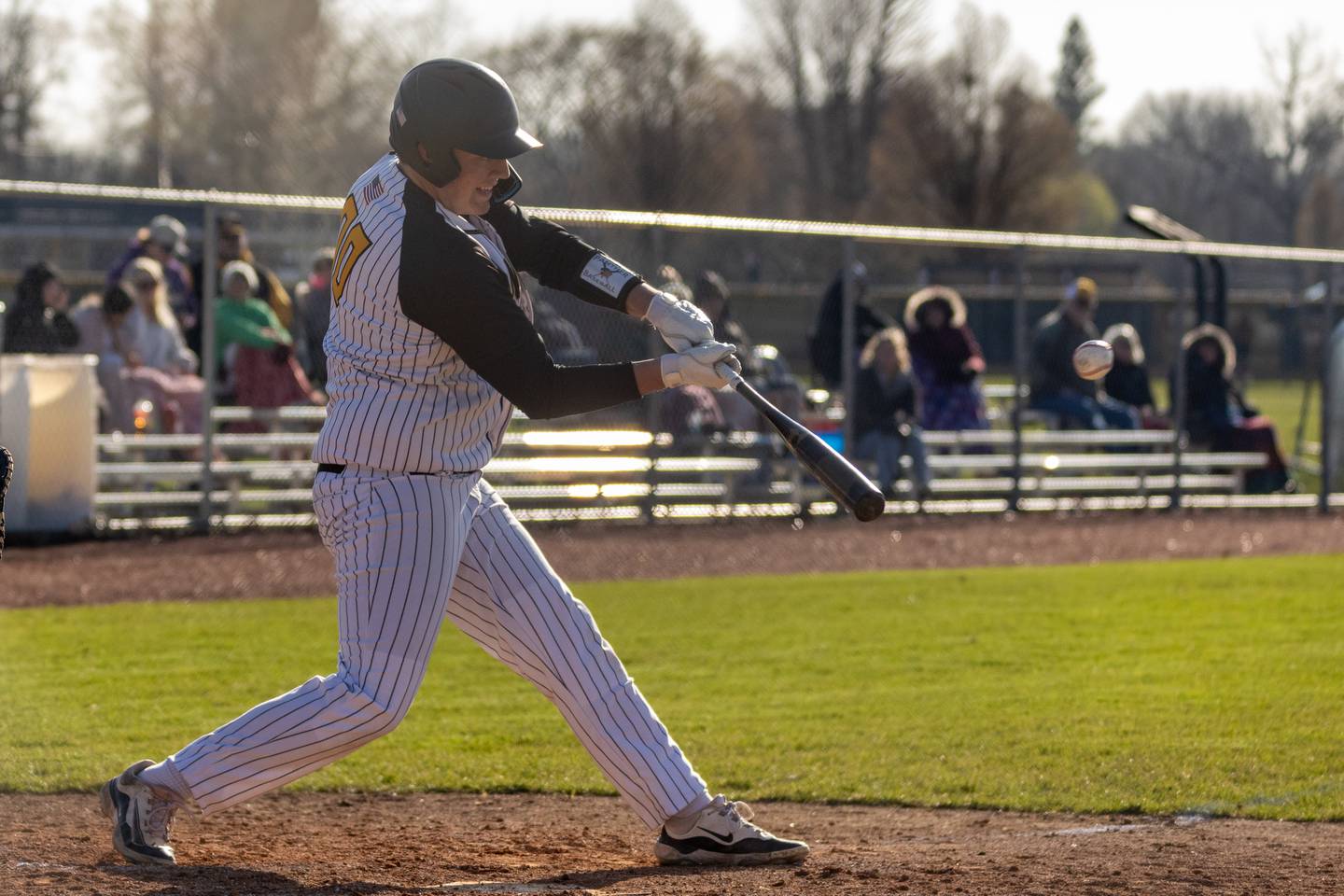 Jaden Stoddard (00) of Putnam County hits ball on Tuesday, April 8, 2025 at Putnam County High School in Granville.
