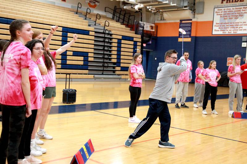 Wil Jarvis hits his shot during a golf lesson in his physical education class at Oswego High School on Monday, March 4, 2024. The class was part of a six-week program collaboration with the U.S. Adaptive Golf Alliance.