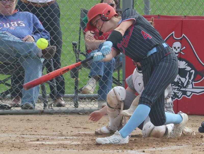 Ottawa's Teagan Darif blasts a home run against L-P on Tuesday, April 14, 2026 at Ottawa High School.