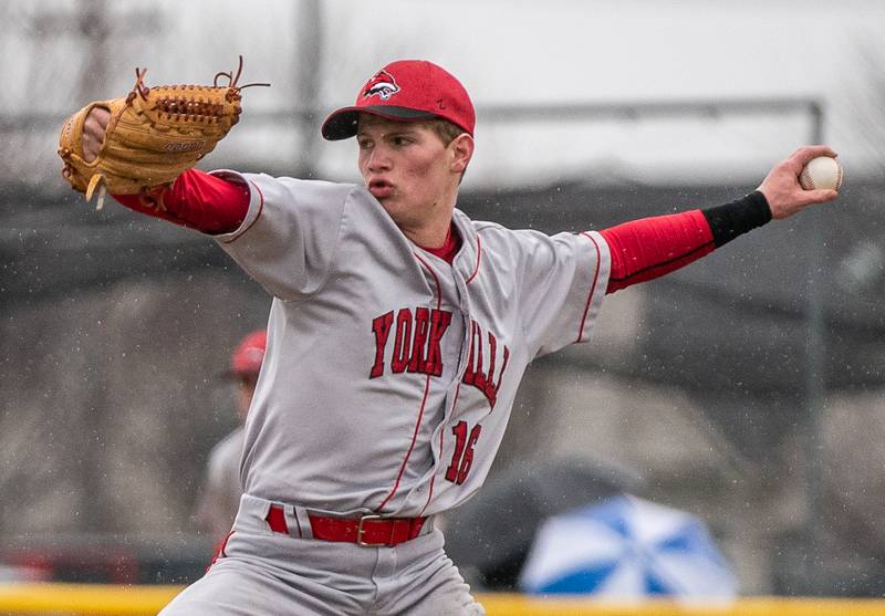 Yorkville's Simon Skroch (16) delivers a pitch against Plainfield North during a baseball game at Plainfield North High School on Thursday, April 20, 2022.