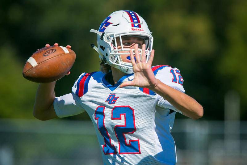 Dundee-Crown quarterback Josh Raby prepares to pass in the first quarter Sept. 22 at Cary-Grove. Raby is weighing his college options.