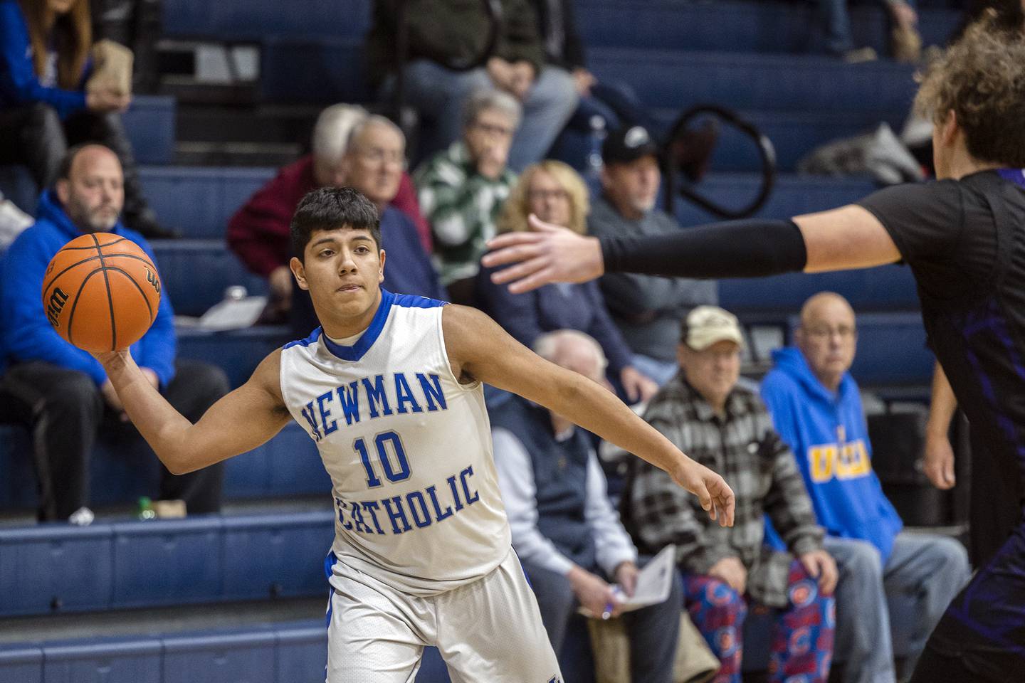 Newman's Gabe Padilla looks to pass Tuesday, Dec. 13, 2022 against Pecatonica.