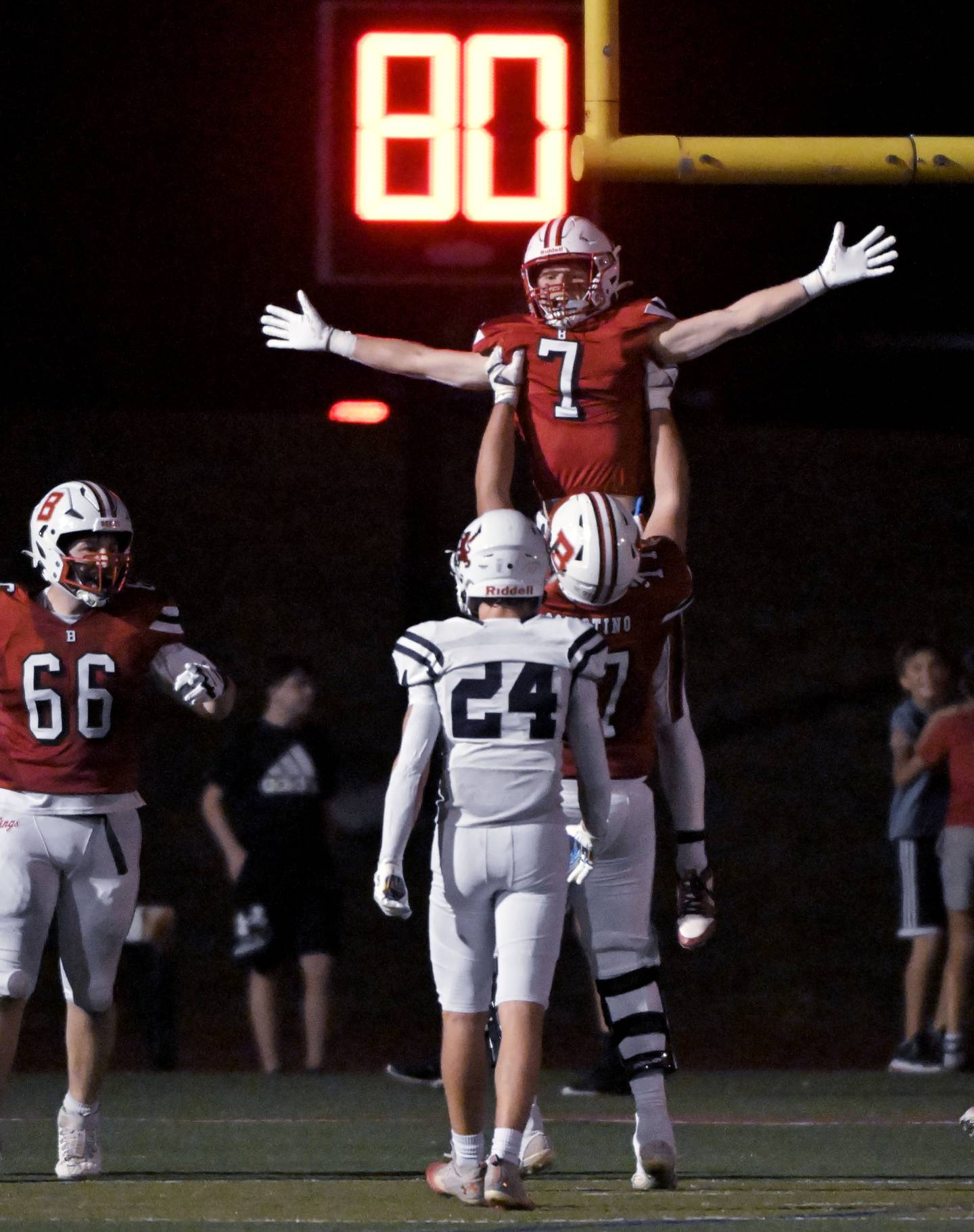 Benet Academy’s Luke Doyle celebrates a touchdown agianst Saint Viator in a football game at Benedictine University in Lisle on Friday, Sept. 20, 2024.