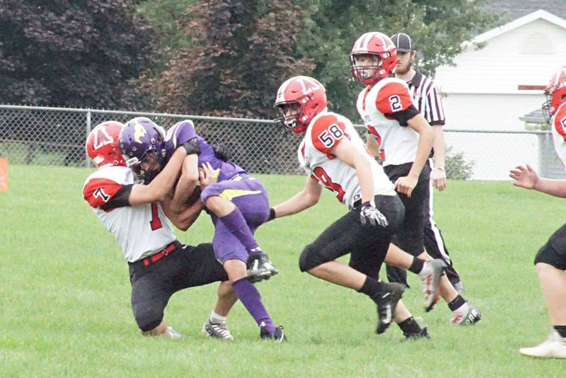 Amboy’s Troy Anderson takes down a runner Saturday, Sept. 24, 2022 against Orangeville.