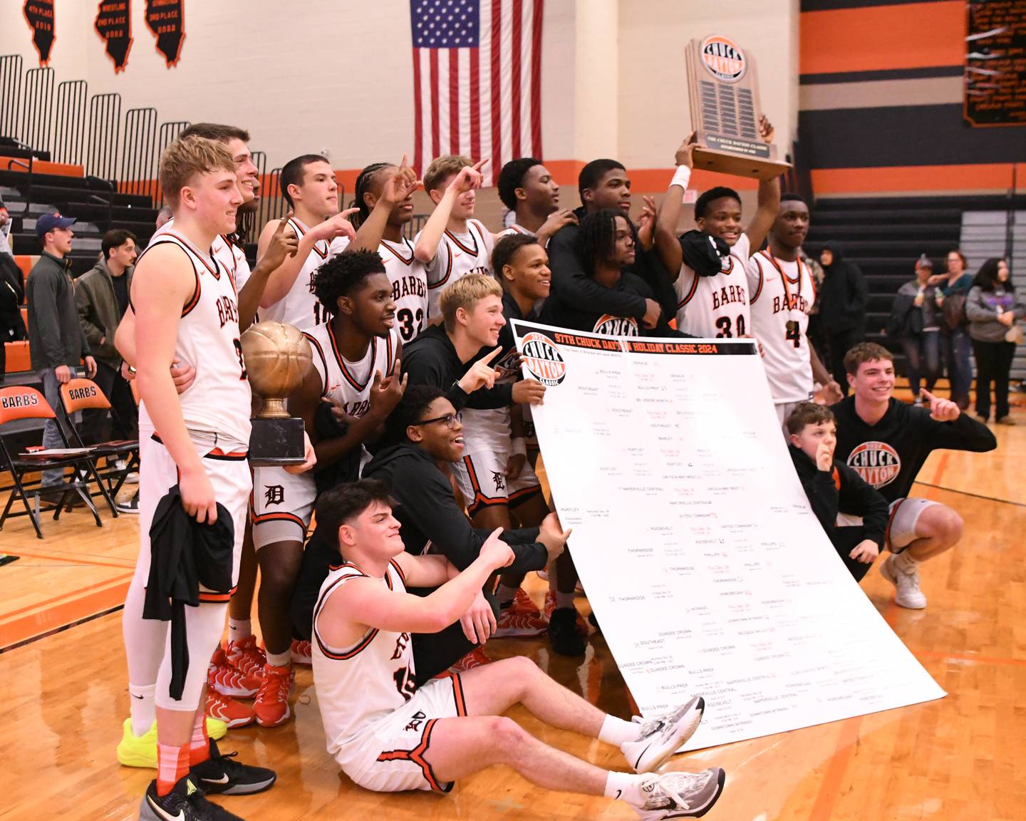 DeKalb pose for a photo after winning the 97th Chuck Dayton Classic Basketball championship game held at DeKalb High School.
