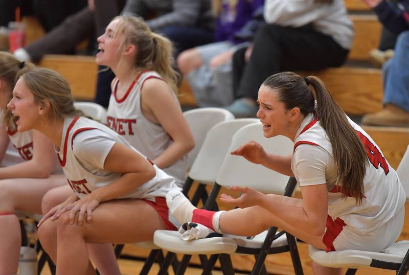 Benet’s Ava Mersinger (right) tries to rally her team from the bench after leaving the game with an injury during a game against Nazareth Academy on January 28, 2026 at Benet Academy in Lisle.