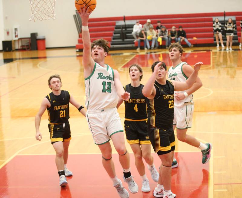 Rock Falls's Austin Castaneda eyes the hoop against Putnam County's AJ Furar during the 50th annual Colmone Classic on Monday, Dec. 9, 2024 at Hall High School.