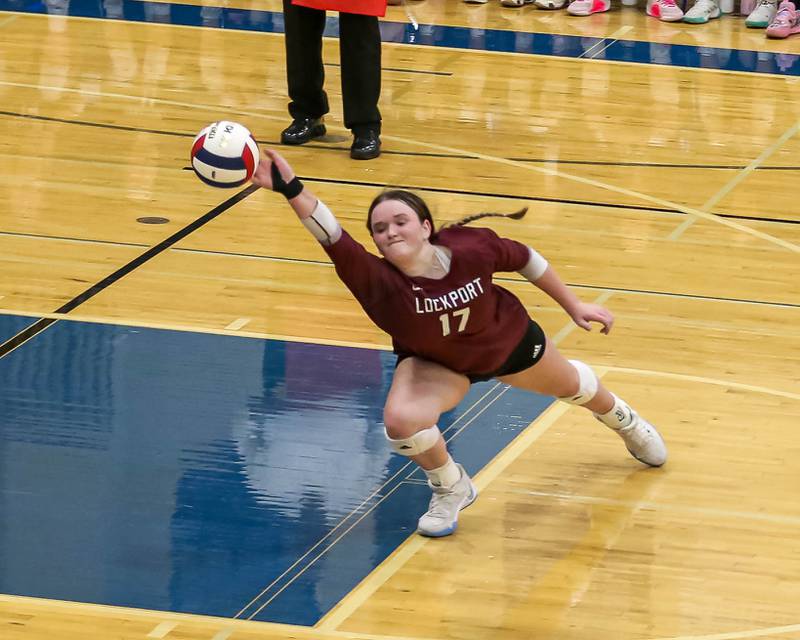 Lockport's Bridget Ferriter (17) attempts a bump save during Class 4A Riverside-Brookfield Supersectional match between Lockport at Downers Grove South.  Nov 11, 2024  in Riverside.