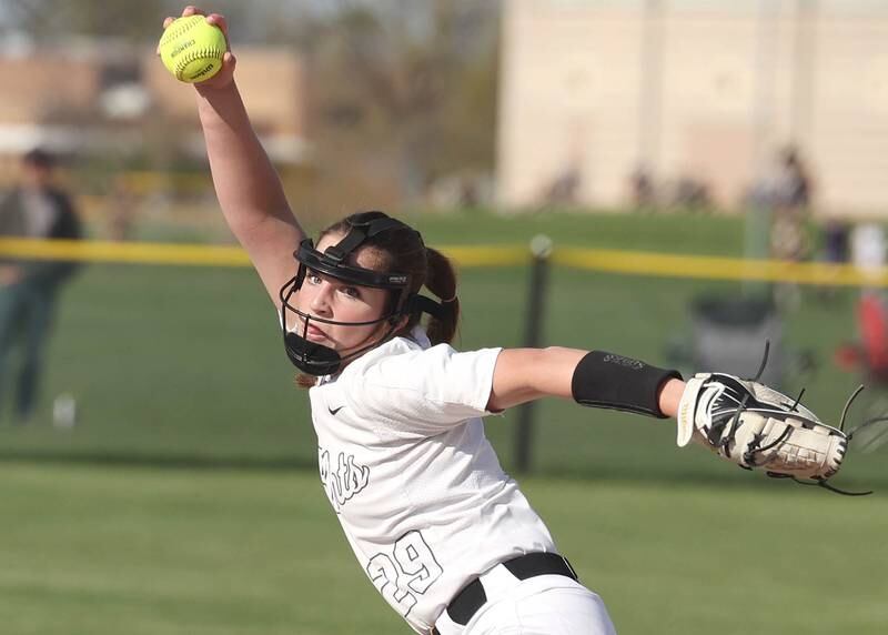 Kaneland's Brynn Woods delivers a pitch Friday, April 28, 2023, during their game at Sycamore High School.