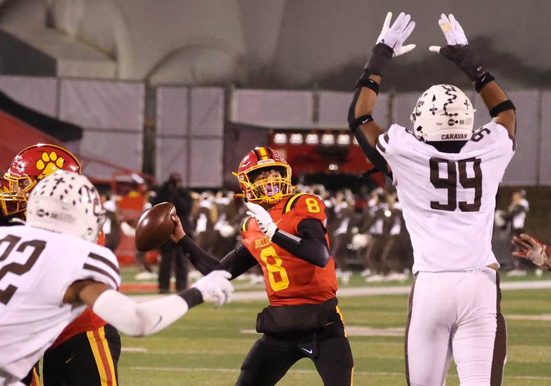 Batavia's Michael Vander throws over Mt. Carmel’s Braeden Jones during their Class 8A state championship game Saturday, Nov. 30, 2024, in Hancock Stadium at Illinois State University in Normal.