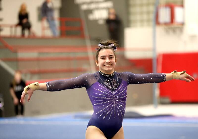 Downers Grove Co-op’s Genevieve Herion competes on the floor exercise during the Hinsdale Central Sectional on Monday, Feb. 10, 2025 in Hinsdale.