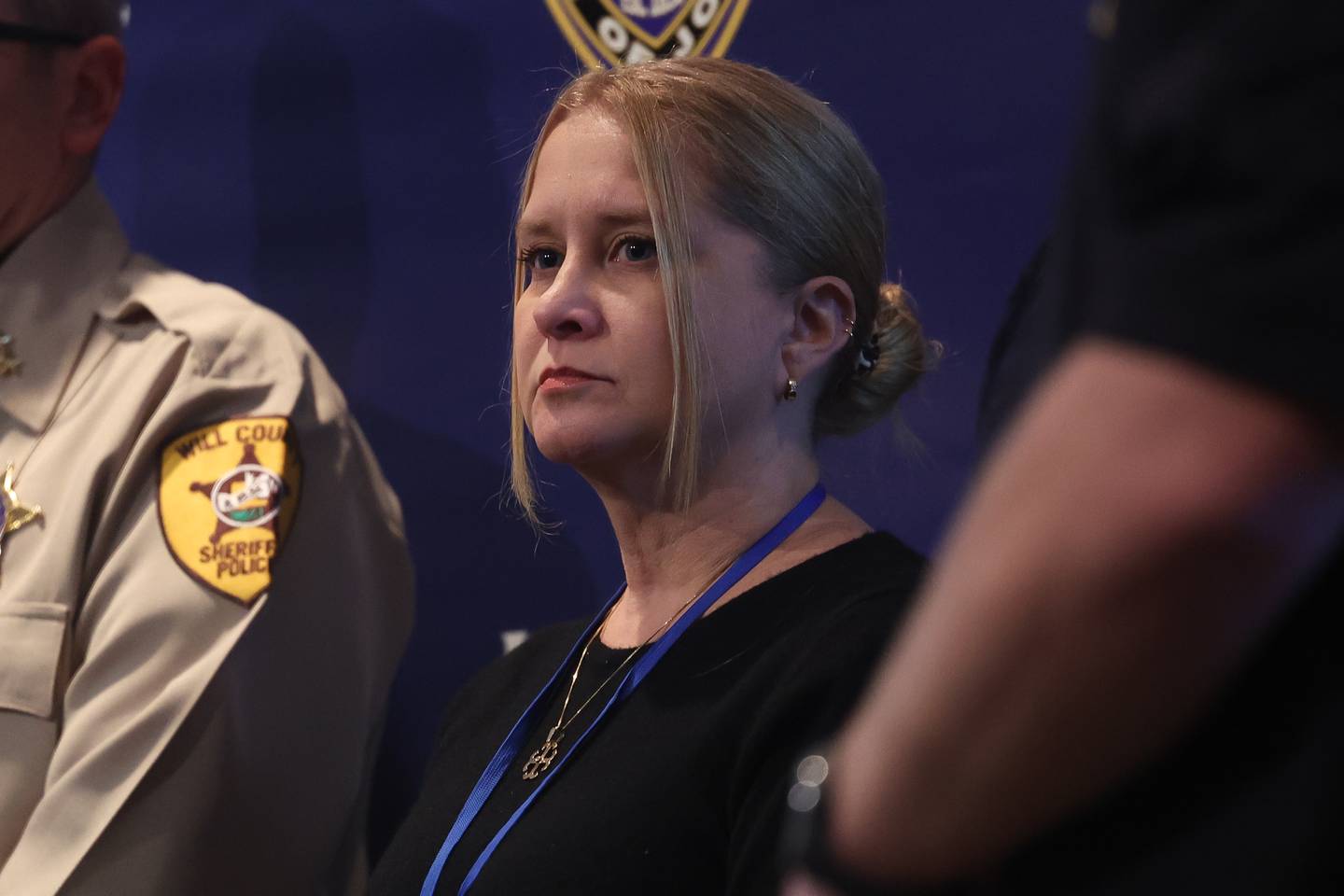 Joliet City Manager Beth Beatty attends the press conference at Joliet City Hall on Tuesday, Jan. 23 where local law enforcement gave updates on the mass shooting on the 2200 block of  West Acres Road on Sunday.  Seven people were killed in two homes. Another person was shot to death in Joliet Township that same day.