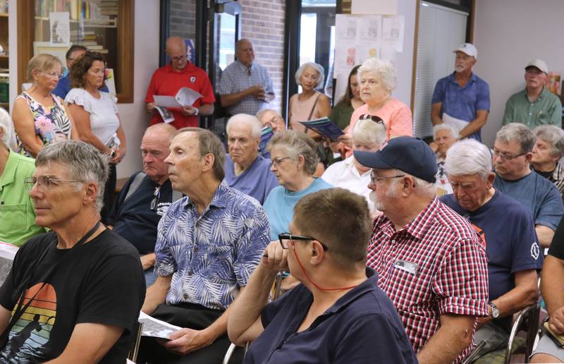 A standing room only crowd jammed the Flewellin Memorial Library in Shabbona Monday, Aug. 5, 2024, to hear U.S. Rep. Lauren Underwood, D-Naperville, and Raphael J. Wahwassuck a tribal council member from the Prairie Band Potawatomi Nation answer questions during a community conversation regarding the Prairie Band Nation Potawatomi Tribe land transfer in DeKalb County.