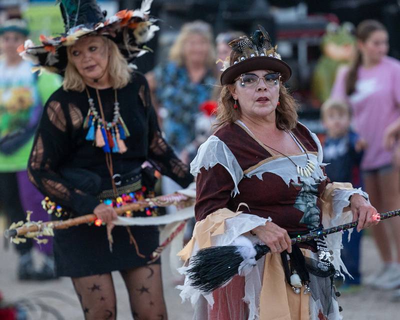'Hocus Pocus Hags' perform dance routine in front of crowd at the Monster Mash Balloon Bash on Saturday, Oct. 4, 2025 at the Bureau County Fairgrounds in Princeton.