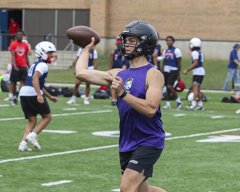 Downers Grove North's Owen Lansu throws a pass during the Downers Grove South 7 on 7 football tournament, July 12, 2025  in Downers Grove.