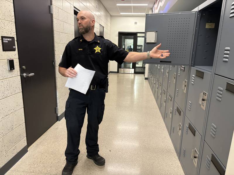 Sgt. Chad Riffe shows a police officer locker at the Lake in the Hills Police Department Wednesday, May, 20, 2026.