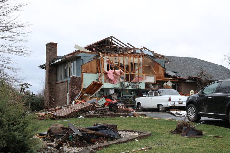 Damage to homes is seen along Shaftsbury Road in Aroma Park on March 11, 2026 following a March 10 tornado that passed through Kankakee County.