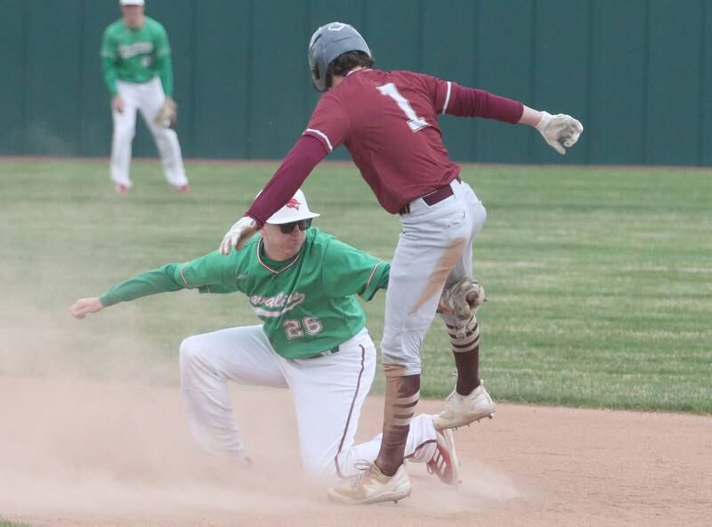 L-P's Brandon Foreman tags out Morris's AJ Zweeres while attempting to steal second base on Wednesday, April 17, 2024 at Huby Sarver Field inside the L-P Athletic Complex in La Salle.