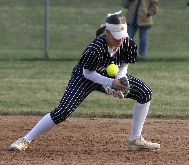 Crystal Lake Central's Kate Show fields a had hit ball before forcing a runner out at second base to end the Fox Valley Conference game against Huntley on Tuesday, April 8, 2025, at Huntley High School.