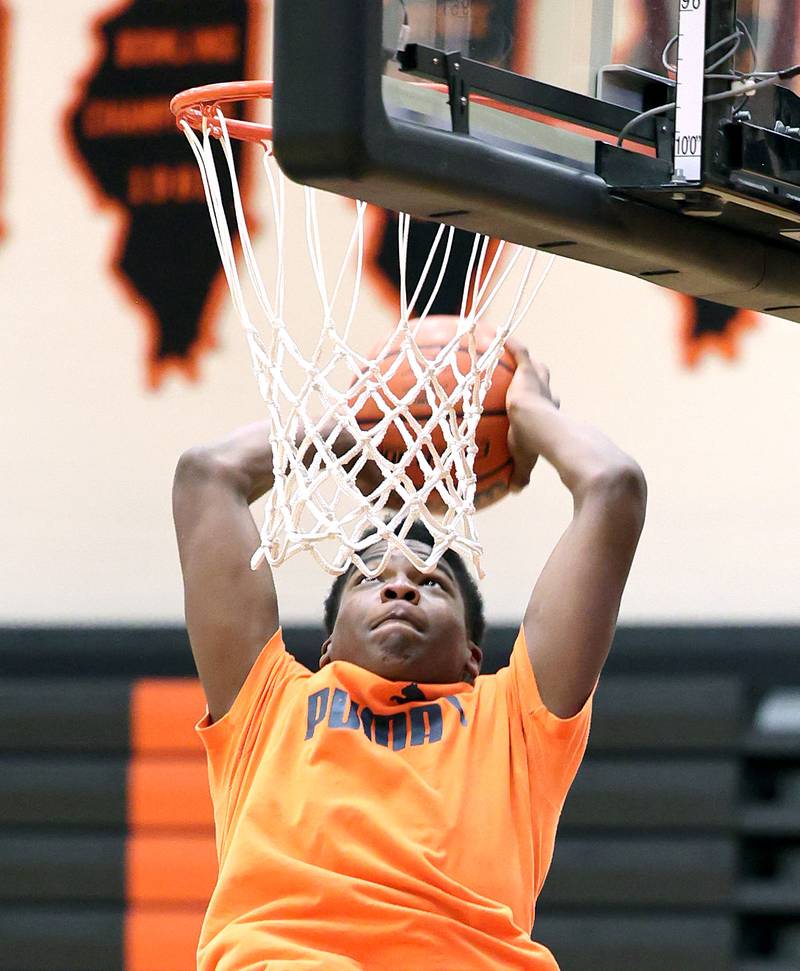 DeKalb’s Davon Grant goes up for a dunk during practice Monday, June 19, 2023, at DeKalb High School.
