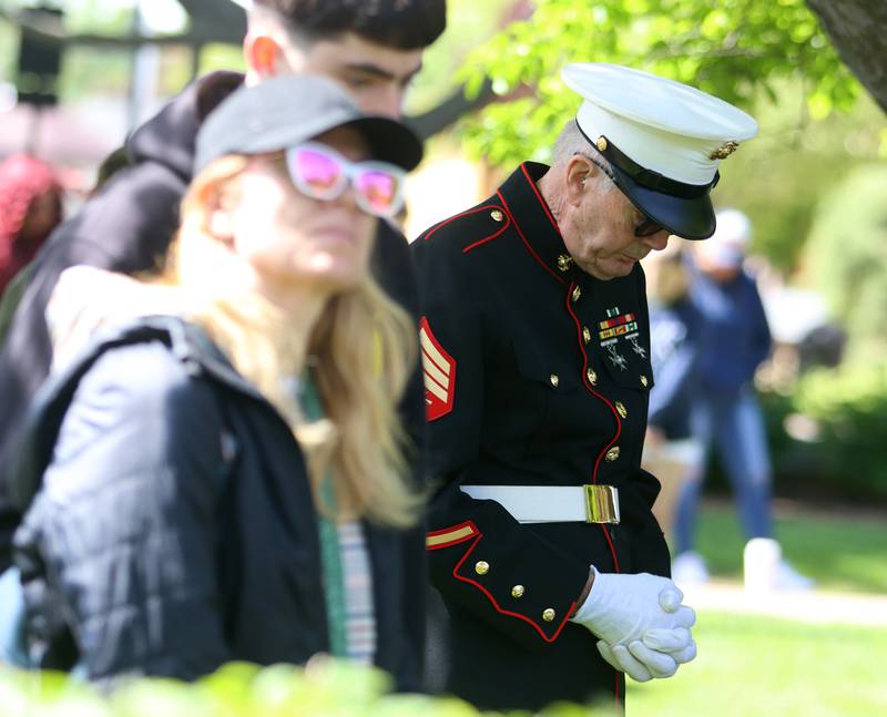 Alexander Case of Woodstock pauses during a Memorial Day service and parade in downtown Woodstock on Monday, May 26, 2025. Case served in Vietnam with the Marines from 1966-1970.