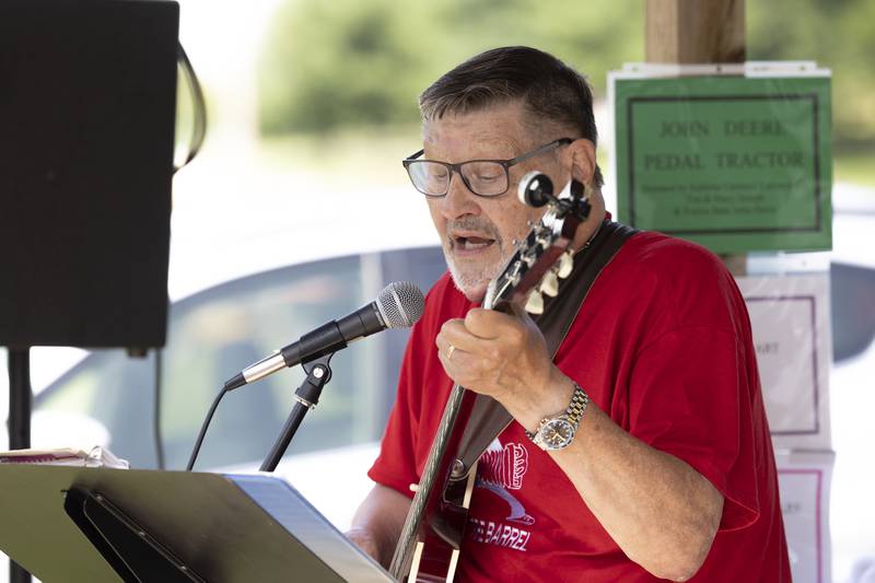 Chuck Kearns sings Saturday, Aug. 3, 2024, at the Living History Antique Equipment Association’s farm show in Franklin Grove.