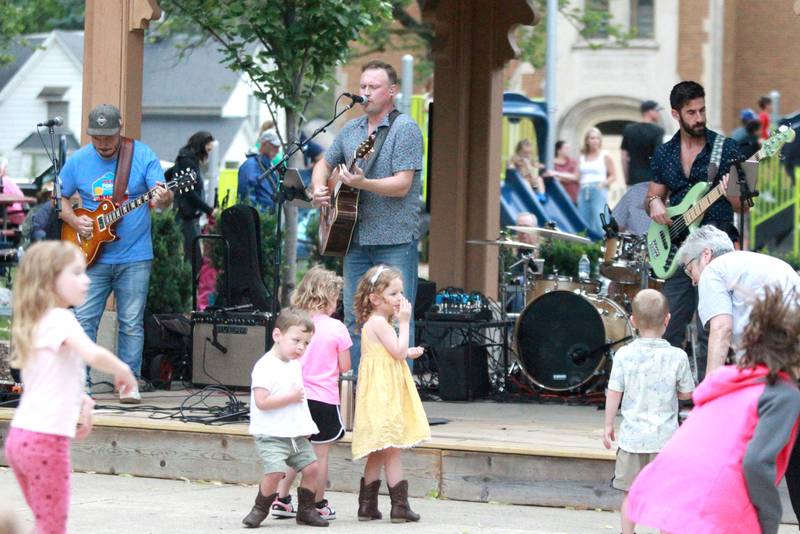 True Company performs cover song hits from every decade to a crowd at the Lincoln Park gazebo in downtown St. Charles on Thursday, June 27, 2024.