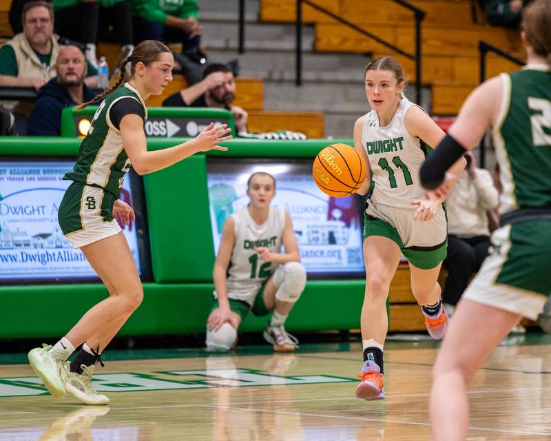 Olivia Buck (11) of Dwight dribbles ball down court on Monday, January 19, 2026 at the Krese Memorial Gymnasium in Dwight.