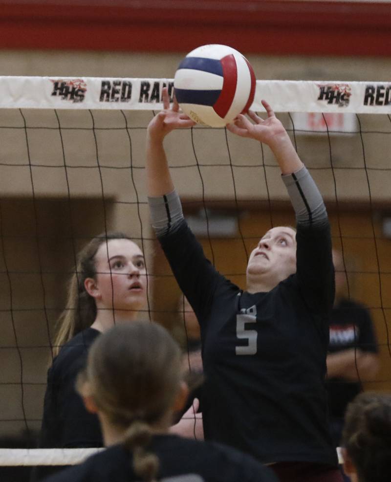 Prairie Ridge's Grace Jansen sets the ball during a Fox Valley Conference volleyball match against Huntley on Tuesday, Oct. 8, 2024, at Huntley High School.