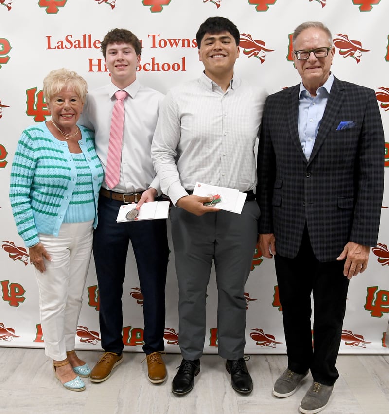La Salle-Peru seniors Mikey Hartman (second from left) and Andy Medina (second from right) received the George Preston Blow Medal/John & Lucy Pomatto Scholarship, presented by Jane Riva (left) and Doug Pomatto. The $1,500 scholarship is considered the highest award the L-P athletics department bestows. A recipient must have a GPA of at least 3.0 and have been outstanding in general athletics. Candidates are nominated by varsity head coaches and voted on by L-P administrators. Hartman was NewsTribune All-Area in football and basketball. Medina was NewsTribune All-Area in football and also played basketball and competes in track and field.