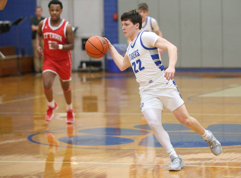 Princeton's Evan Driscoll looks to pass the ball against Ottawa on Monday, Feb. 5, 2024 at Prouty Gym.