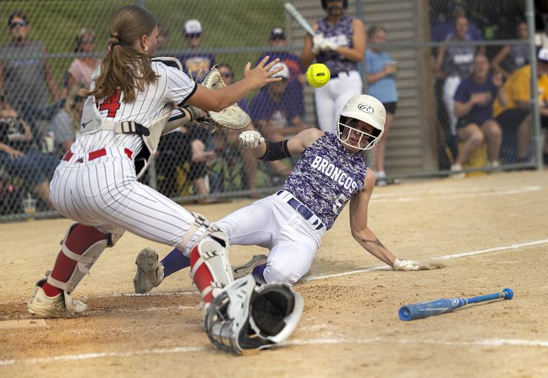 Orangville’s Ashlynn Schultz comes in to score against Fulton’s Averi Bush Tuesday, May 26, 2026, at the Eastland Class 1A softball sectional quarterfinal.