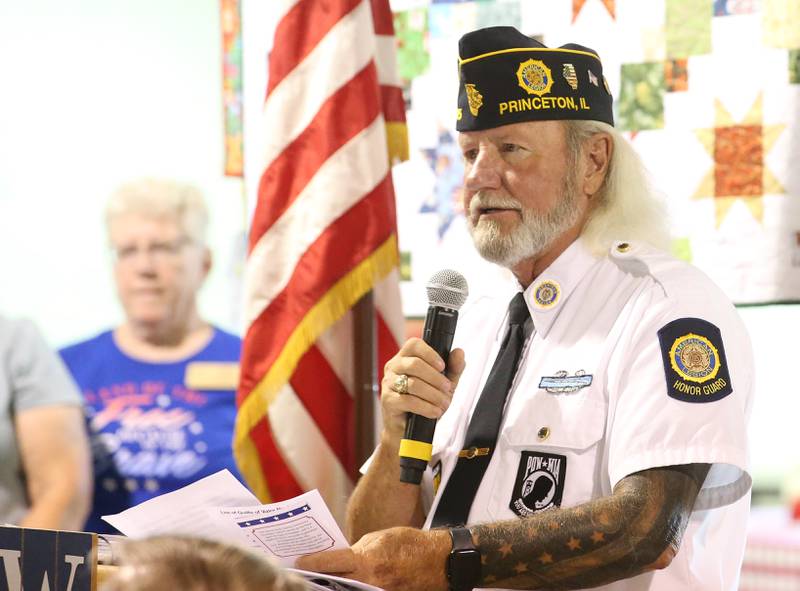 Tom Root, Retired Command Sergeant Major, speaks during the Quilt of Valor Tribute to Veterans on Wednesday, Aug. 20, 2025 at the Bureau County Fair in Princeton.