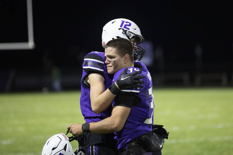Dixon’s Jackson Koehler and Owen Belzer come together after a tough loss against Coal City Friday, Nov. 7, 2025.