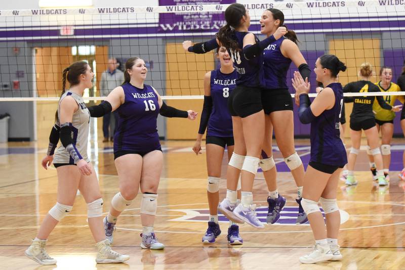 The Wilmington girls volleyball team celebrates a point during their home victory against Coal City Thursday, Sept. 25, 2025.
