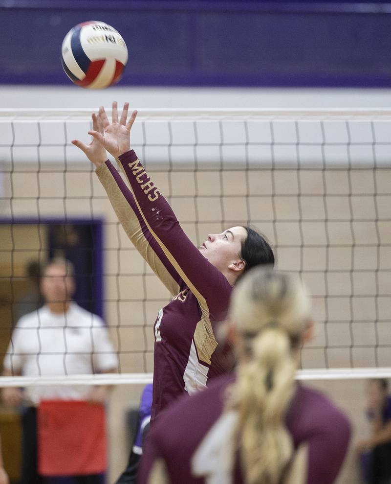 Morris’ Alexis Williams sets the ball against Dixon Thursday, Oct. 31, 2024 in the class 3A regional championship at Dixon High School.