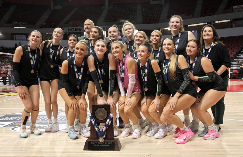 Nazareth poses with their second-place trophy after losing to Normal U-High in the Class 3A final match at the IHSA girls volleyball state finals tournament on at Illinois State University on Saturday, Nov. 15, 2025
