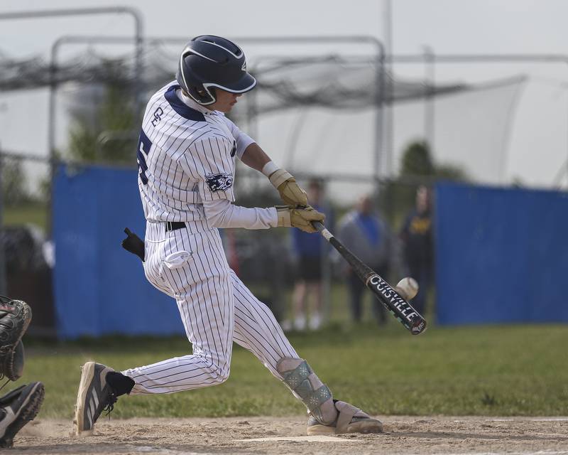 Oswego East's Jax Wellehan (5) puts bat on ball during baseball game between Oswego East at Oswego. Monday, May 19, 2025 in Oswego.
