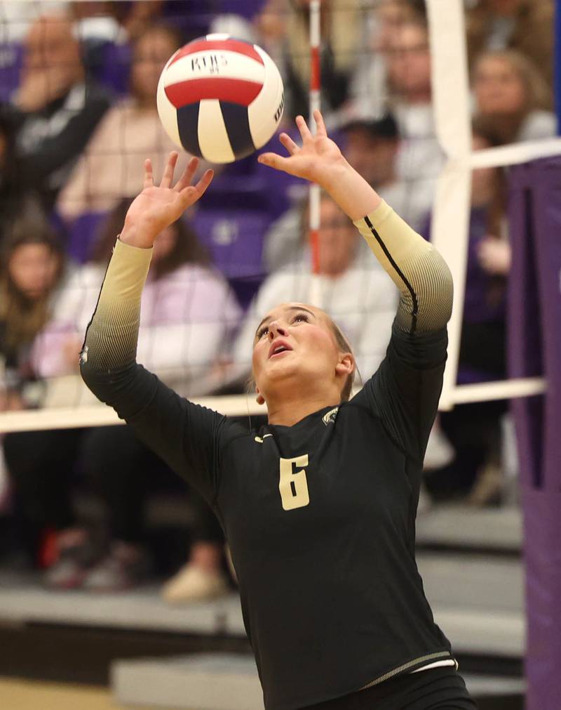 Sycamore's Lana Walker sets the ball Thursday, Oct. 30, 2025, during their Class 3A regional championship match against Dixon in Rochelle.