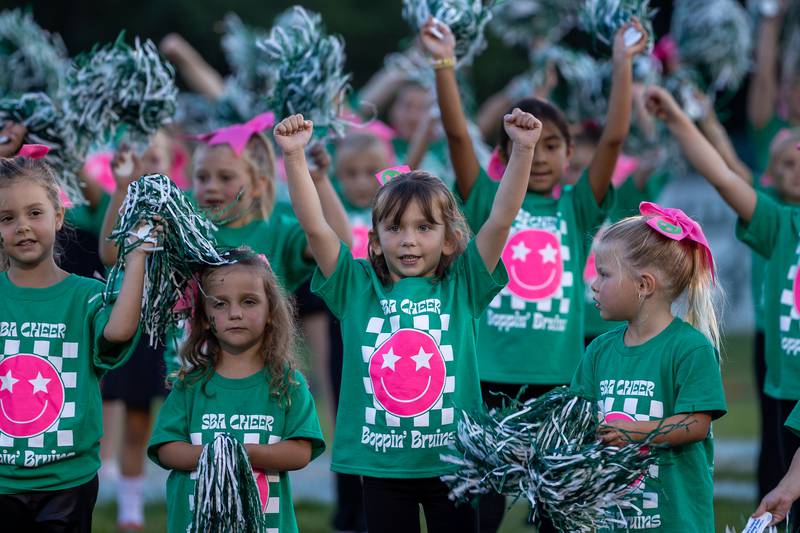 Emma Mcmillin performs cheer with team Boppin' Bruins, during performance on Friday, Sept 12, 2025 at Captain Thomas J. Heitmann field in Peru.