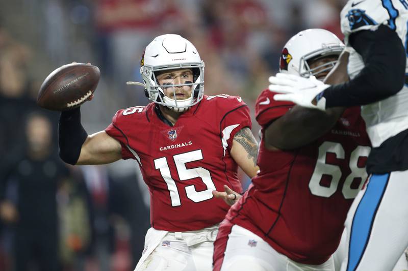 Arizona Cardinals quarterback Chris Streveler looks to throw a pass against the Carolina Panthers on Nov. 14, 2021, in Glendale, Ariz.