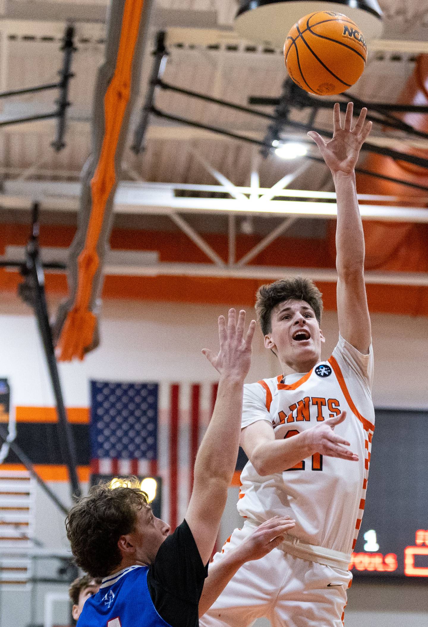 St. Charles East guard Marco Klebosits goes up for a layup during a game against Marmion Academy on Saturday, Jan. 4, 2025.