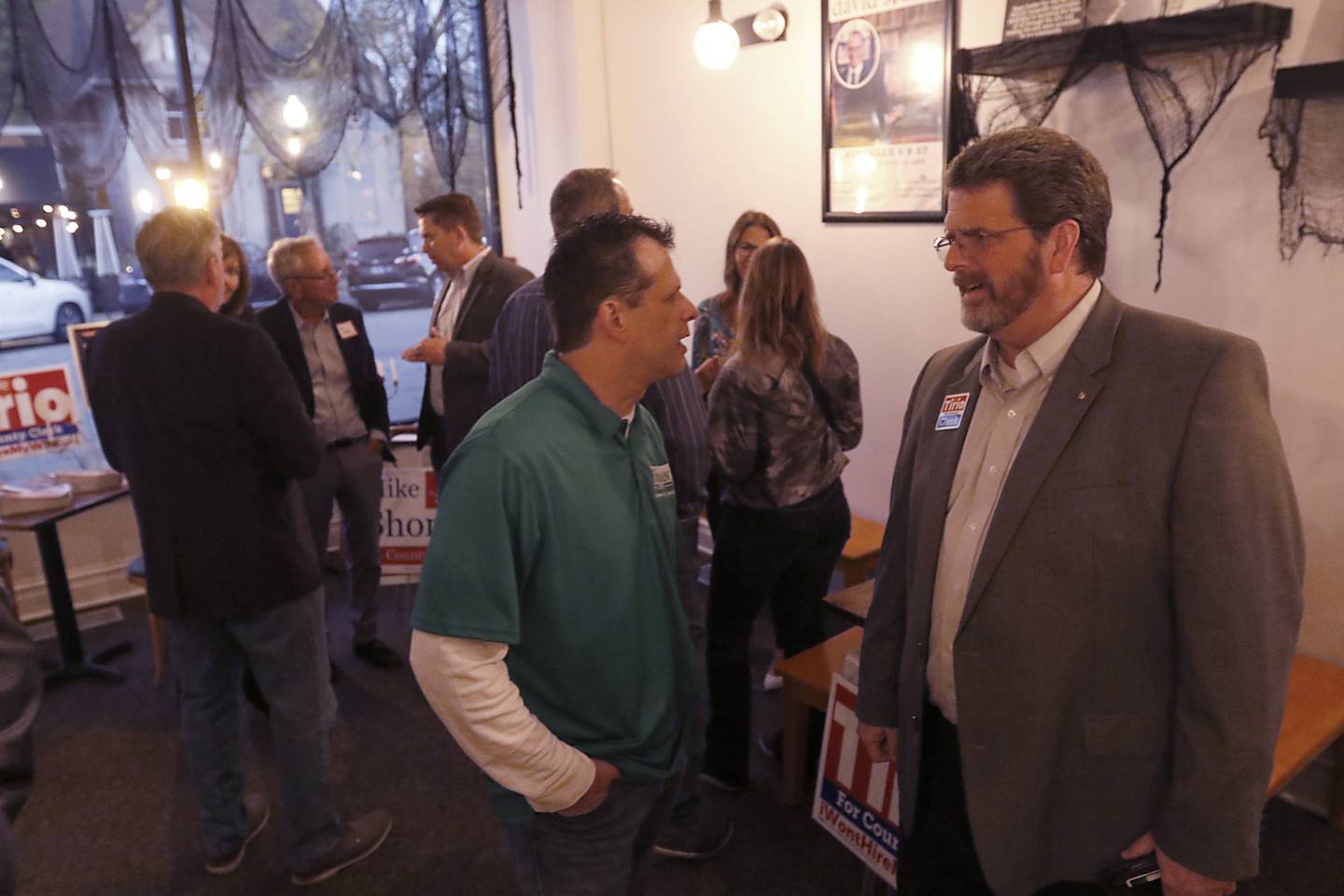 Chris Yaeger talks with McHenry County Clerk Joe Tirio during a meet-and-greet event Wednesday, Oct. 12, 2022, for Republican candidates across the state and county at the Raue Center for the Arts, 26 N. Williams St. in Crystal Lake. The event gave voters a chance to discuss a number of key issues and talk with candidates.