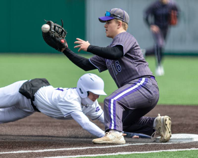 Dixon's Brady Lawrence (16) receives a pick off attempt while Hampshire's Trevor Swanson (24) dives back to first during baseball game between Dixon at Hampshire.  March 28, 2024