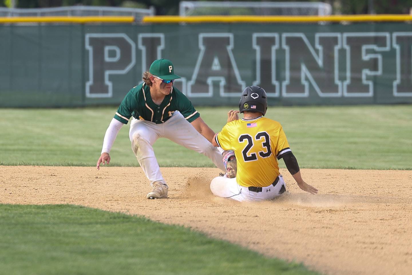Plainfield Central’s JT Augustyniak tags out Joliet West’s Dan Lukancic on the base steal attempt on Thursday, May 16, 2024 in Plainfield.