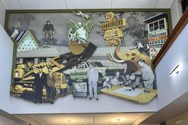 Artist carves out Oswego area history in new library mural