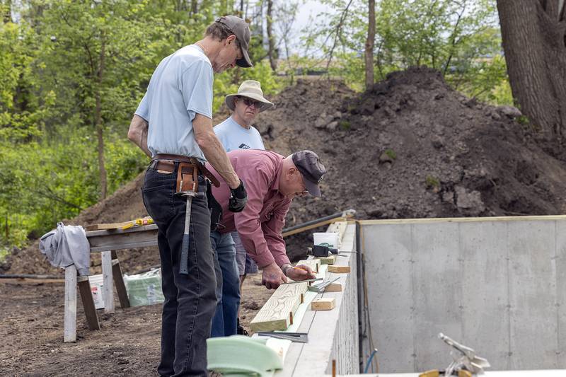 Work crews get to work on the latest Habitat for Humanity home in Dixon Saturday, May 4, 2024.