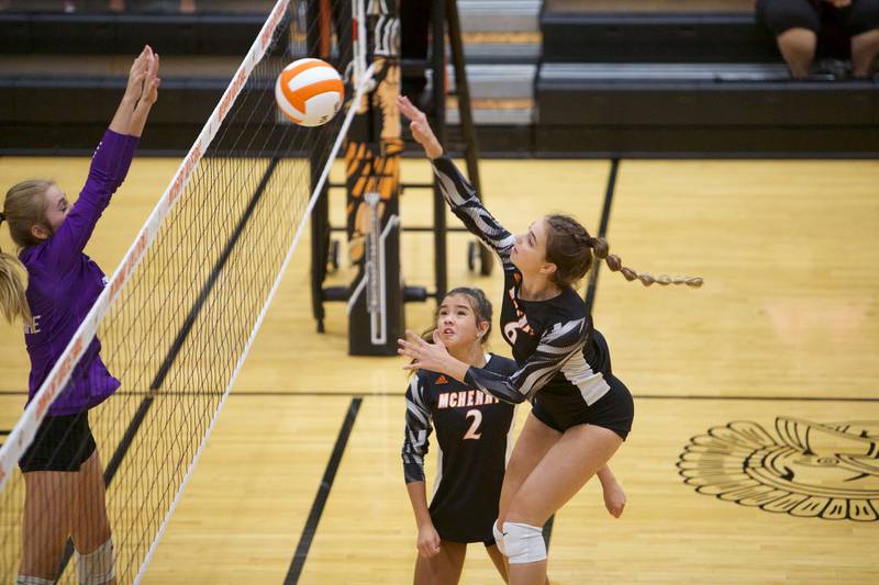 McHenry's Alissa Ricci with the return volley against Hampshire on Tuesday, Sept. 6,2022 in McHenry.
