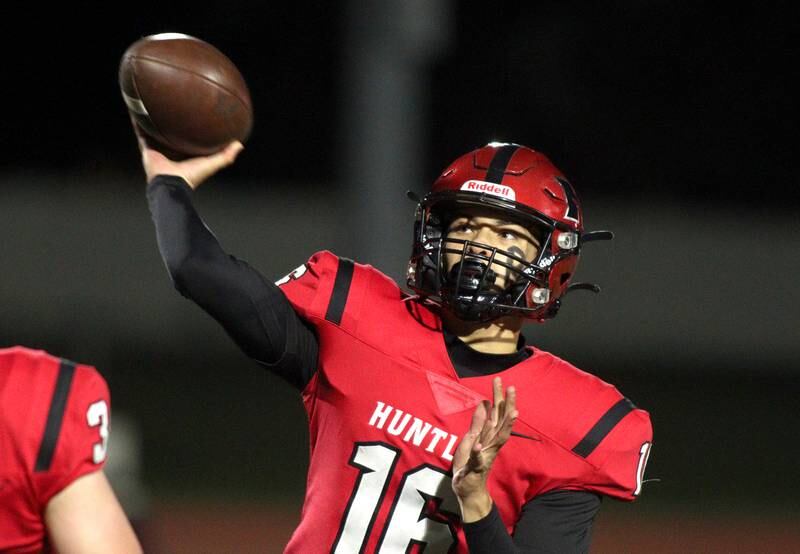Huntley’s Braylon Bower passes against Niles West in first-round Class 8A playoff football action at Huntley Friday.